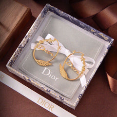 Swan Brass earrings