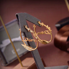 Swan Brass earrings