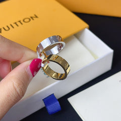 Embossed titanium ring